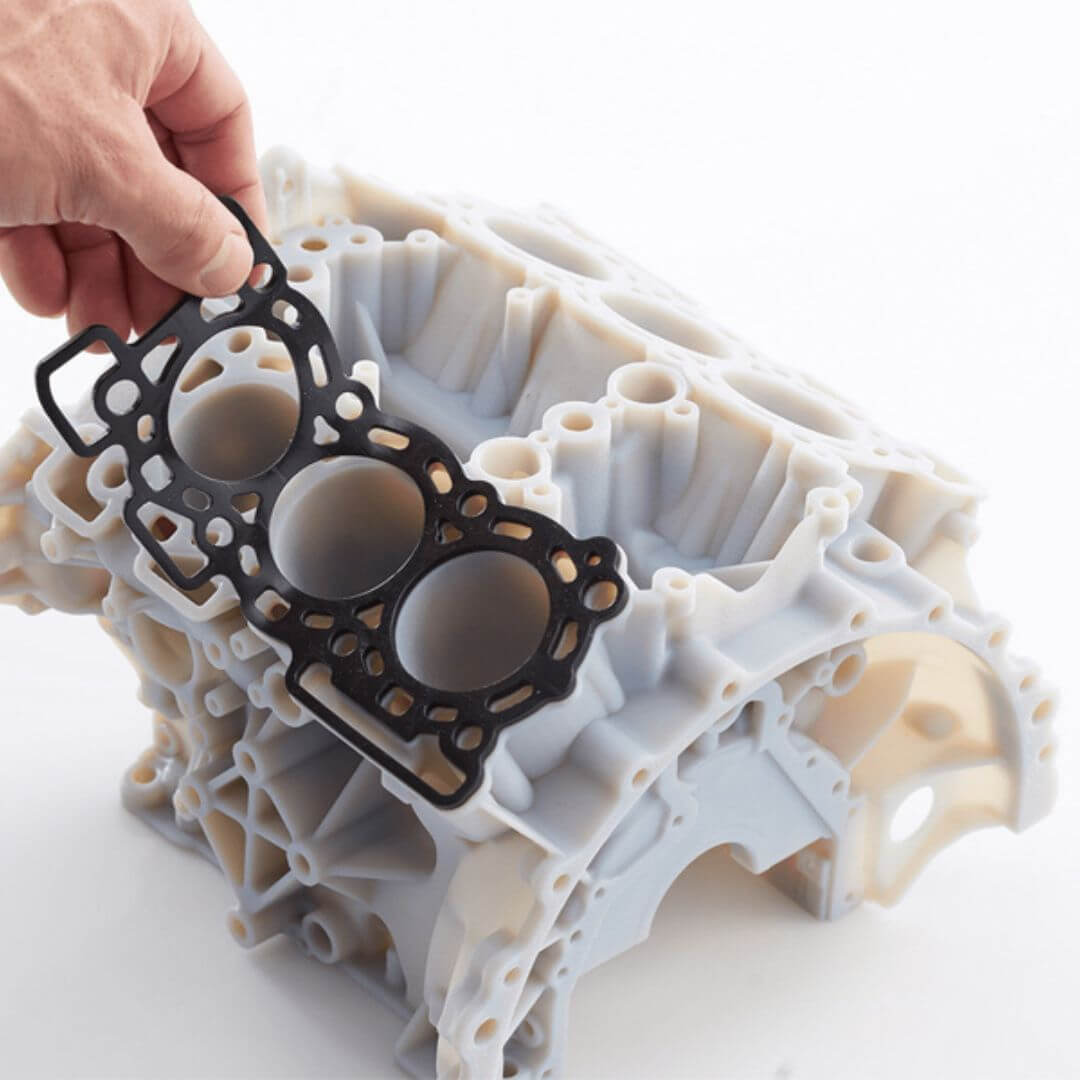 Polymer prototype component and gasket assembly demonstrating additive manufacturing for functional prototyping and product development.