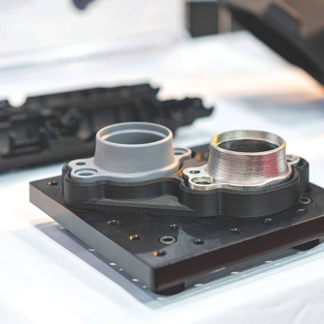 Additive manufactured tooling fixture with integrated metal inserts used for production tooling and manufacturing operations.